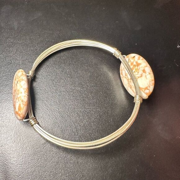 Silver wired metal bracelet with two oval brown swirled stones - Picture 1 of 8